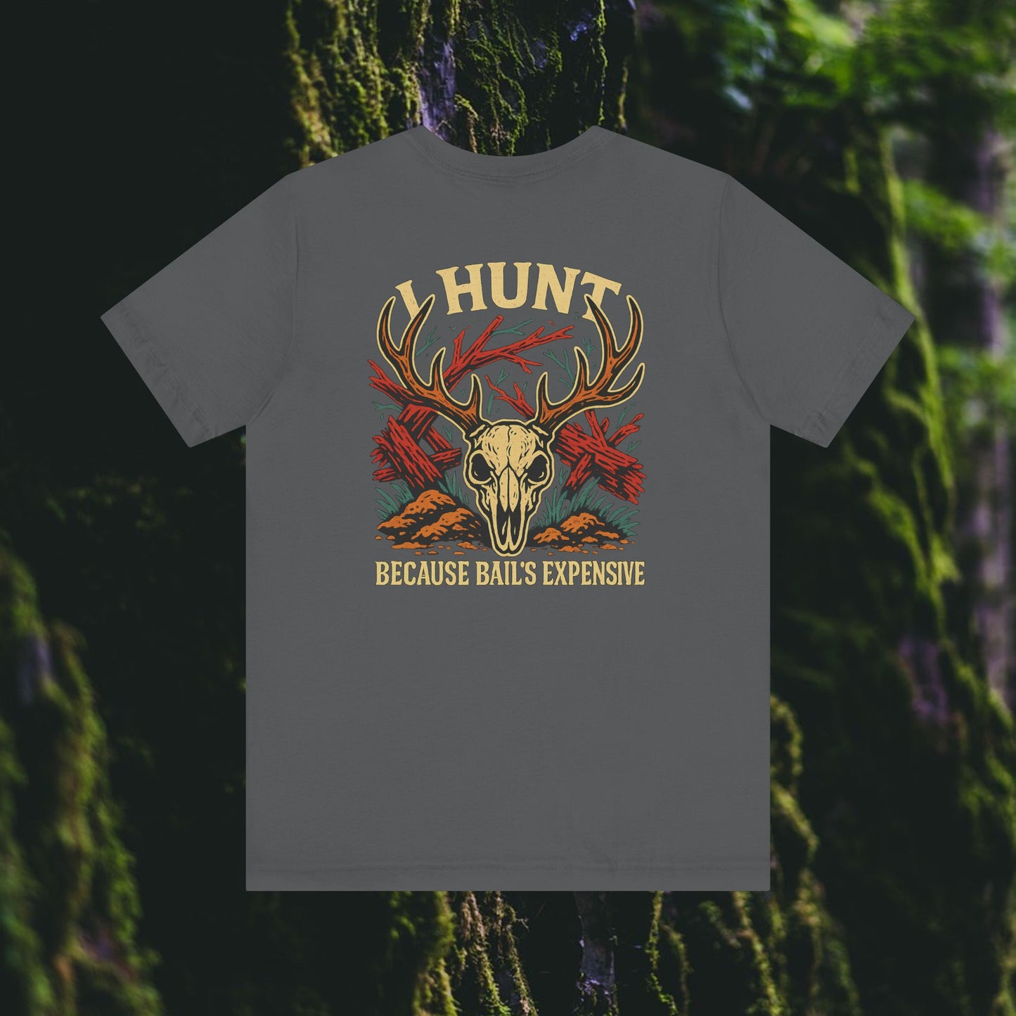 The I Hunt Because Bail’s Expensive Tee – Iron Pines Original by Printify features a deer skull graphic with antlers, red arrows, and bold text on a gray shirt—ideal unisex hunting apparel for outdoor lovers.