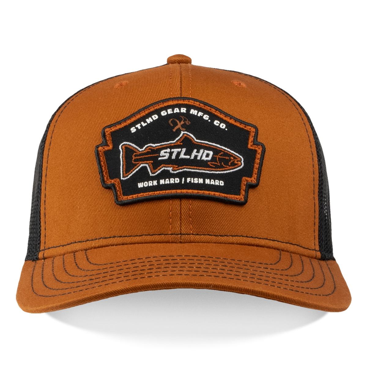 The STLHD GEAR Hook X Hammer Trucker Hat is a brown and black snapback with a front patch featuring a fish outline, crossed hooks, and the text STLHD, STLHD Gear MFG. Co., and Work Hard, Fish Hard.
