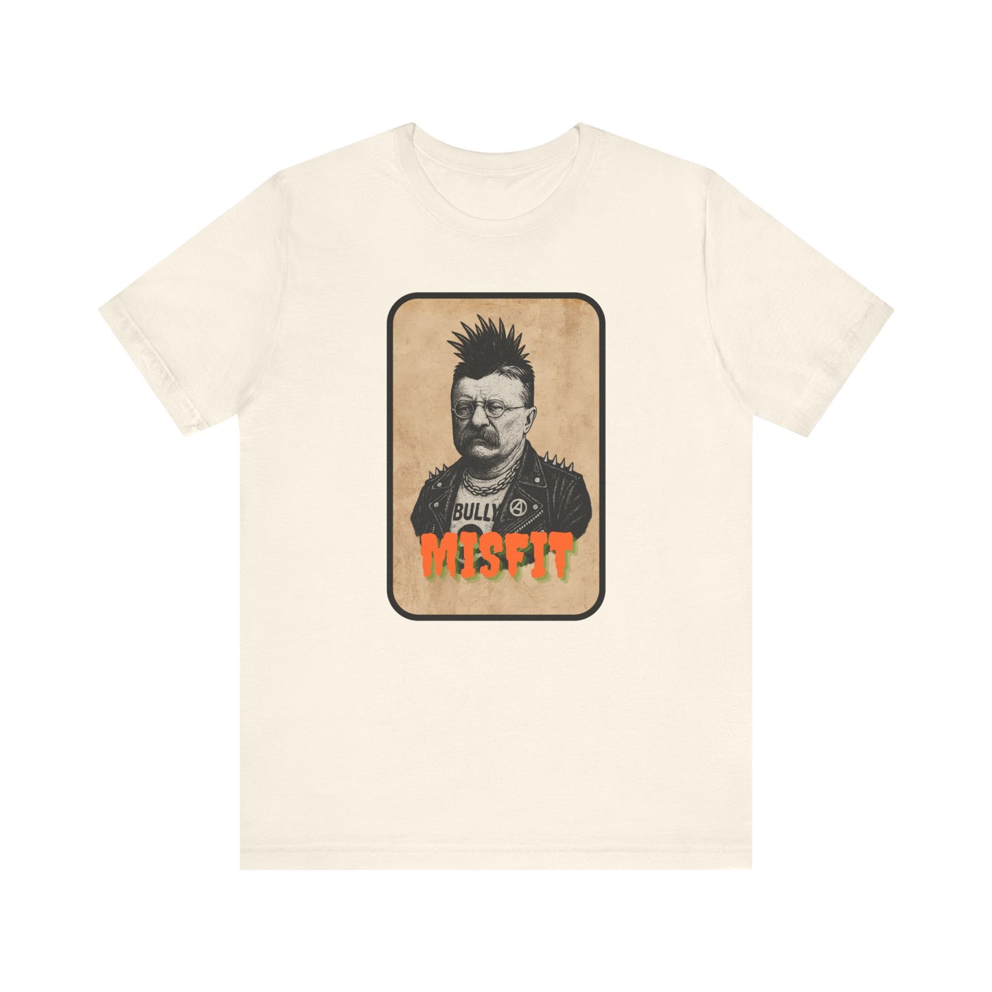The Iron Pines Teddy Roosevelt Punk T-Shirt is a cream misfit history tee with a vintage portrait of Teddy Roosevelt sporting a mohawk, glasses, and spiked jacket. Bold orange MISFIT lettering adds true punk rock style for rebels and patriots.
