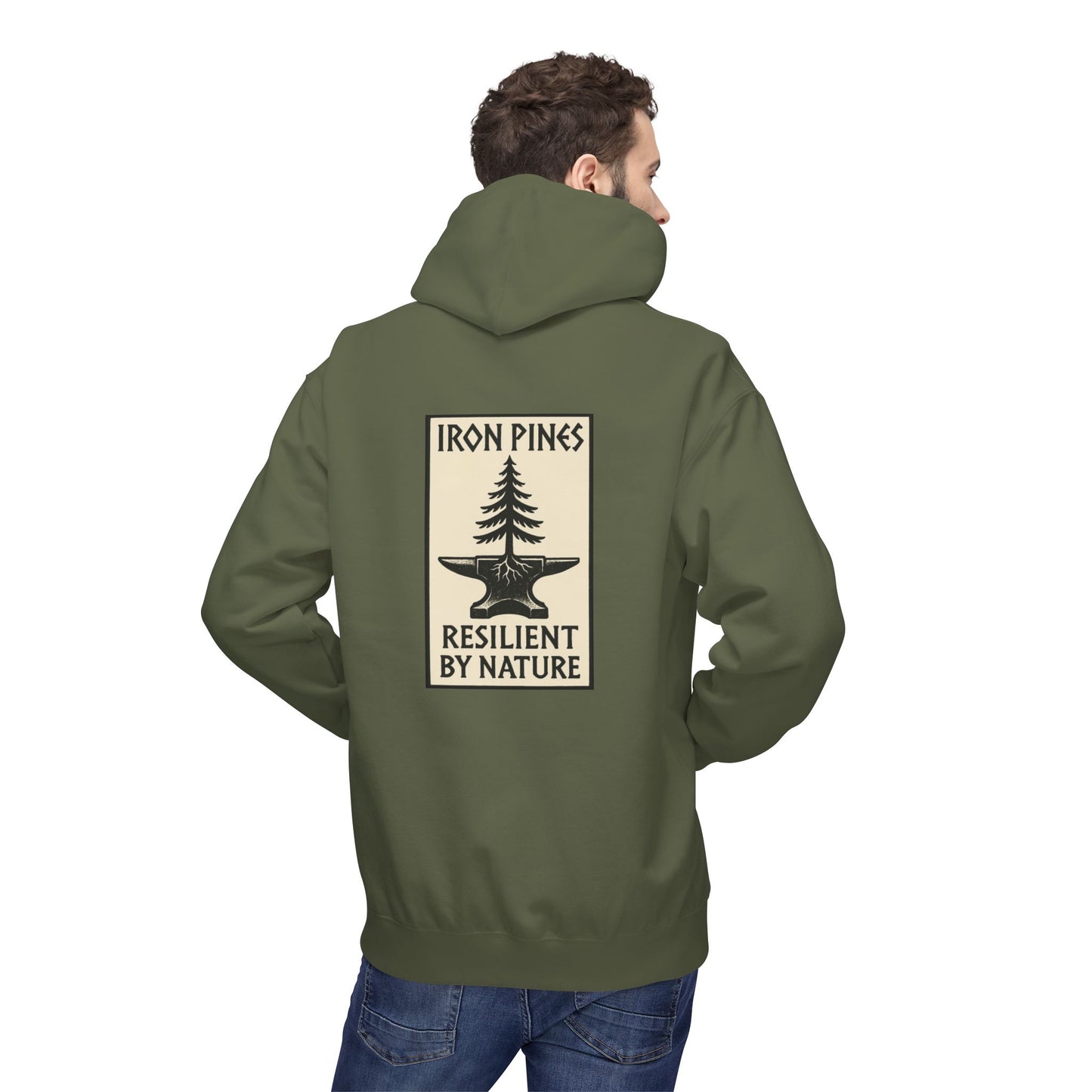 A man wears The Iron Pines Hoodie by Printify in olive green, featuring a large tree-and-anvil graphic with “RESILIENT BY NATURE” on the back—a midweight fleece ideal for those who love sustainable outdoor apparel.