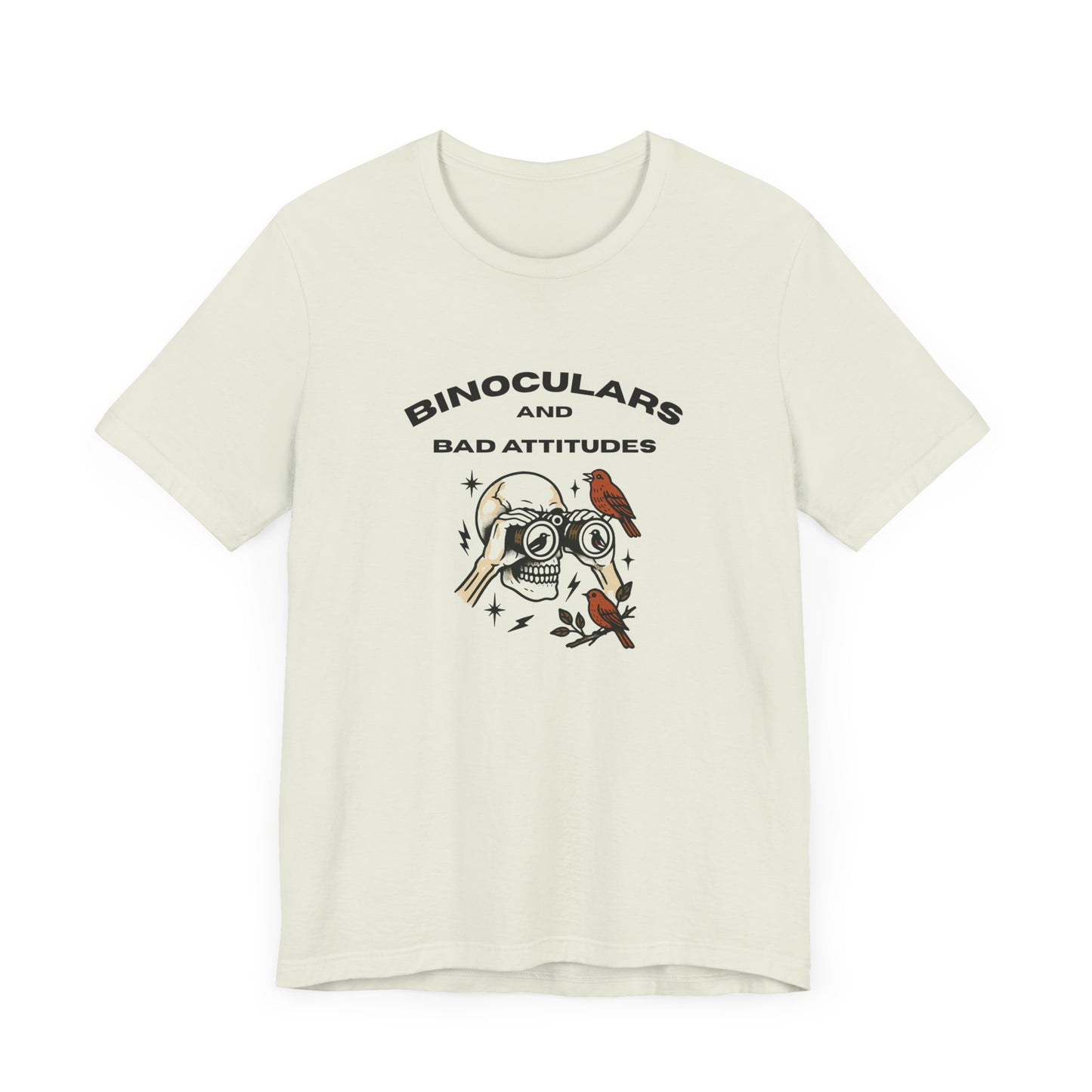 The Printify Bird Watching Is Hardcore T-shirt features a skull with binoculars, birds, and BINOCULARS AND BAD ATTITUDES text—a funny punk birder shirt for misfits, field freaks, or anyone who loves edgy birdwatching style.