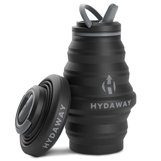 The HYDAWAY 17oz Collapsible Water Bottle from the HYDAWAY Official Store is a black BPA-free silicone bottle with a gray lid and straw, shown both upright and flat. The HYDAWAY logo appears on the bottle and lid—ideal for travel.