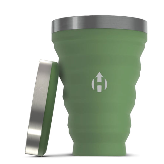 HYDAWAY collapsible 16 oz pint cup in green color, expanded with matching collapsed lid next to it