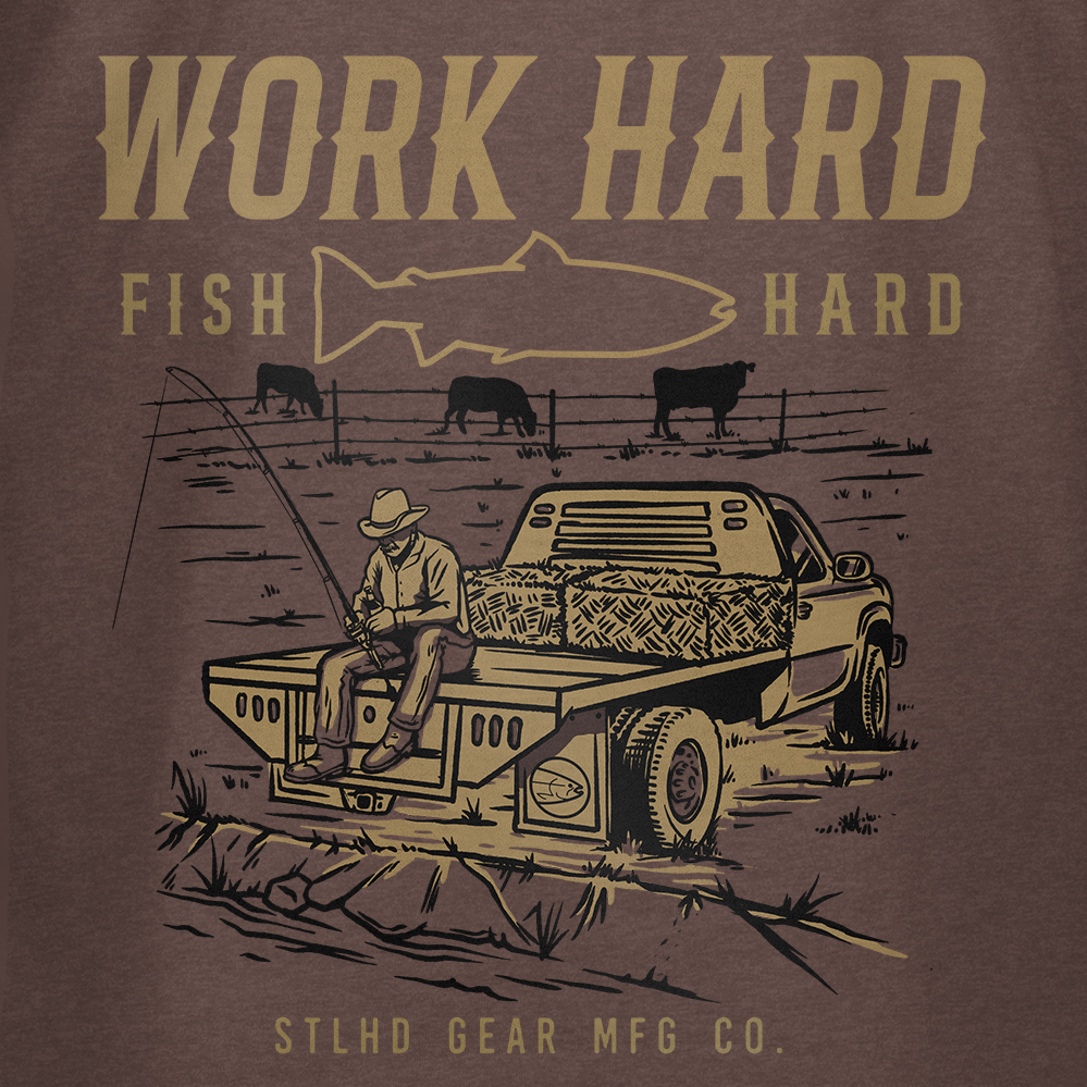 A graphic of a man fishing from a flatbed truck in a field with cows and a fish outline features on the STLHD Rancher T-Shirt by STLHD GEAR, with the words WORK HARD FISH HARD—perfect for any day outdoors.