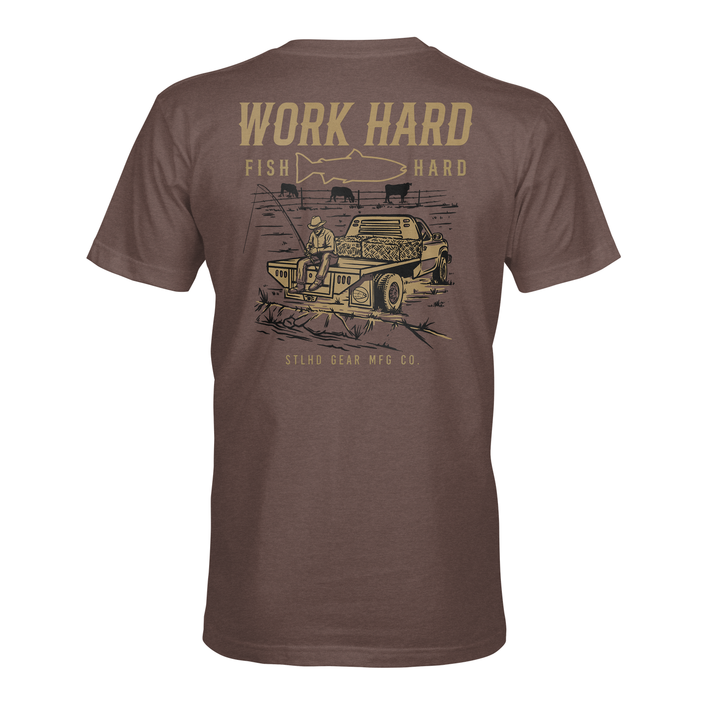 The STLHD Rancher T-Shirt by STLHD GEAR features a graphic of a person fishing by a car, “WORK HARD, FISH HARD” with a fish silhouette above, and STLHD GEAR MFG CO. below—a breathable tee for those who live by the motto.