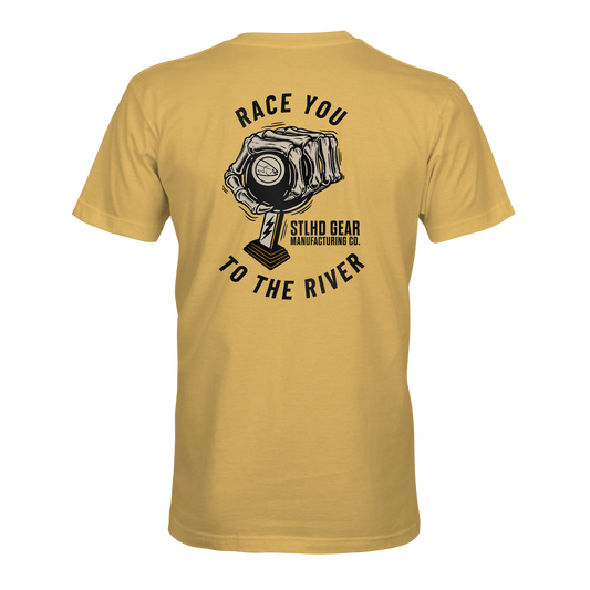 The STLHD Race Ya T-Shirt by STLHD GEAR features a graphic engine piston and crankshaft on the back, bold “RACE YOU TO THE RIVER.” and “STLHD GEAR MANUFACTURING CO.” text, and offers breathable comfort for any adventure.