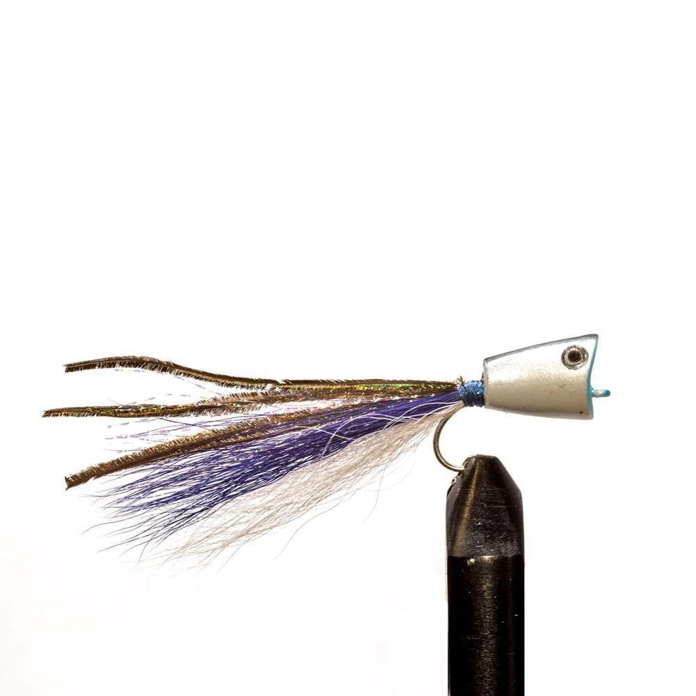 The JHFLYCO Snook Fly Box by Jackson Hole Fly Company features preloaded, saltwater-ready flies with cone-shaped silver heads, blue and white accents, and shimmering strands—perfect for striking saltwater fish. Displayed on a black holder against white.