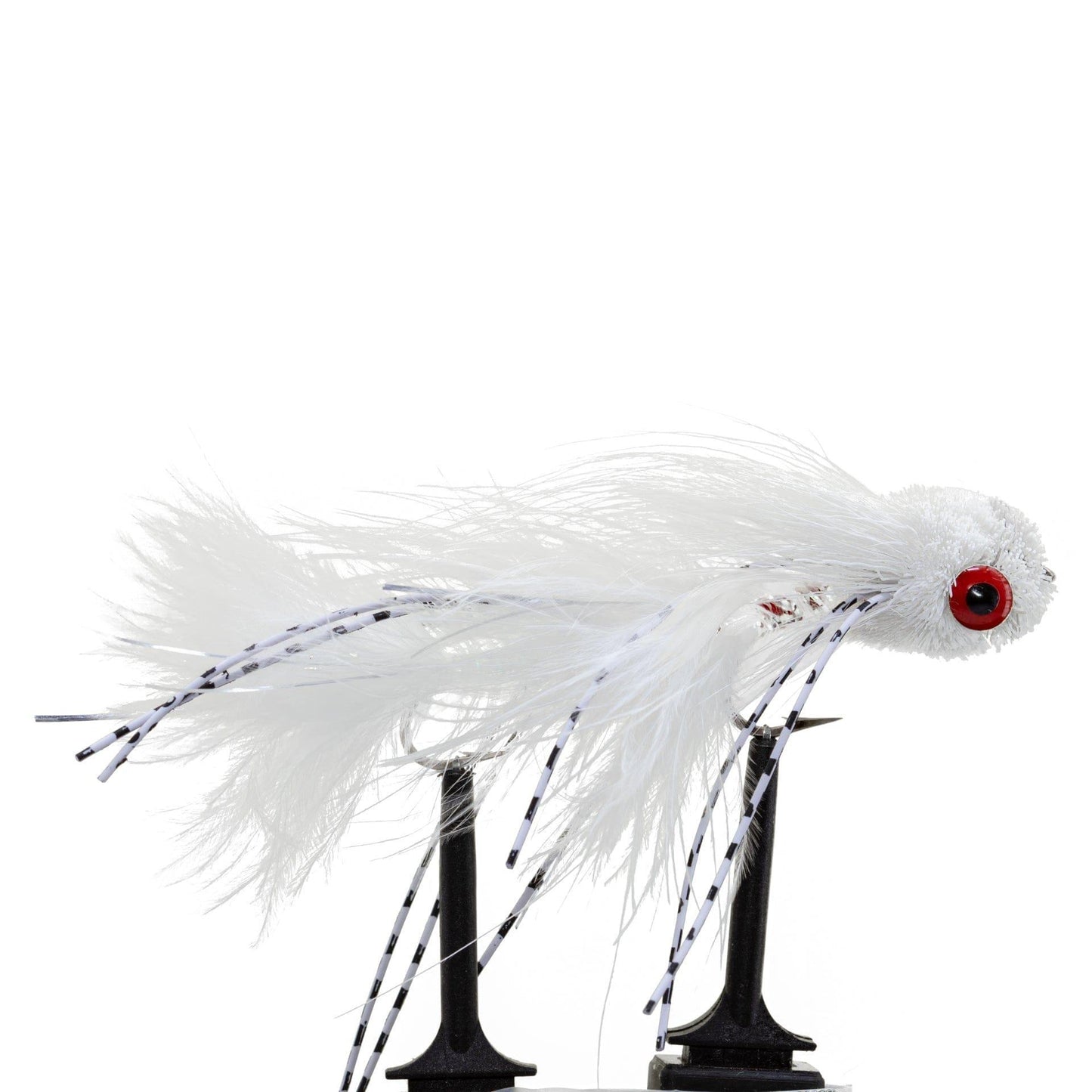 The Jackson Hole Fly Company JHFLYCO Loaded Foam Fly Box – Large Streamer Assortment (10 Flies) includes white articulated streamers with feathery, black-striped tails and bold red-black eyes, shown on a black stand against a white background.