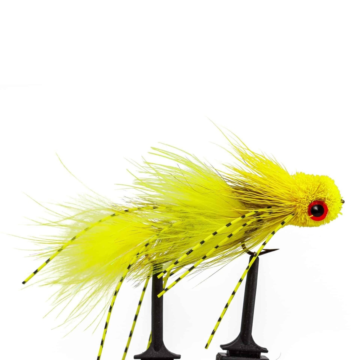 The JHFLYCO Loaded Foam Fly Box – Large Streamer Assortment (10 Flies) by Jackson Hole Fly Company features vibrant yellow flies with bushy bodies, red eyes, and striped rubber legs—ideal for predator fly fishing.
