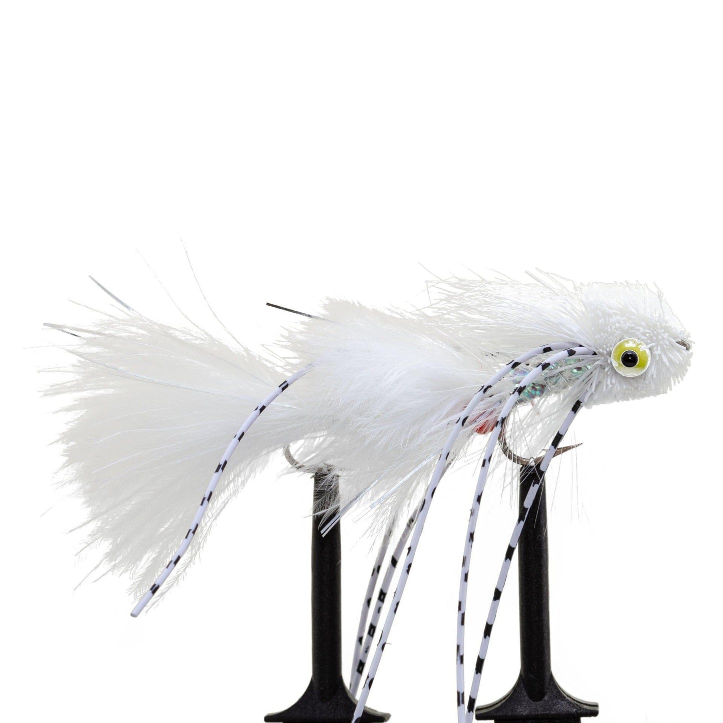 The Jackson Hole Fly Company JHFLYCO Loaded Foam Fly Box – Medium Streamer Assortment features white artificial flies with fluffy tails, rubber legs, and large yellow eyes—ideal for trout fishing—mounted on black stands against a white background.
