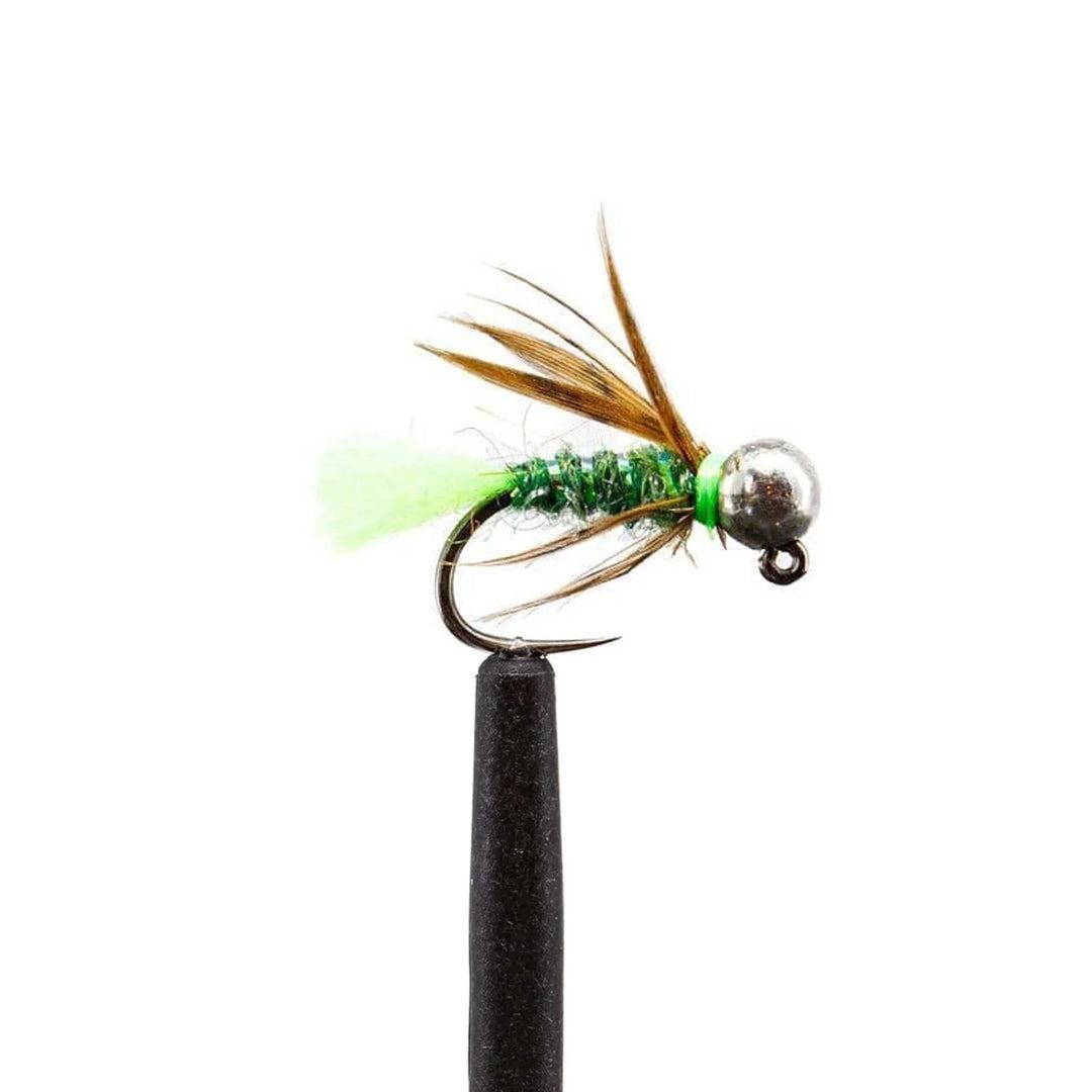 A close-up of the Jackson Hole Fly Company JHFLYCO Loaded Foam Fly Box - Euro Nymph Assortment shows a tungsten jig fly with a silver bead head, green body, brown feather accents, and black hook against a white background.
