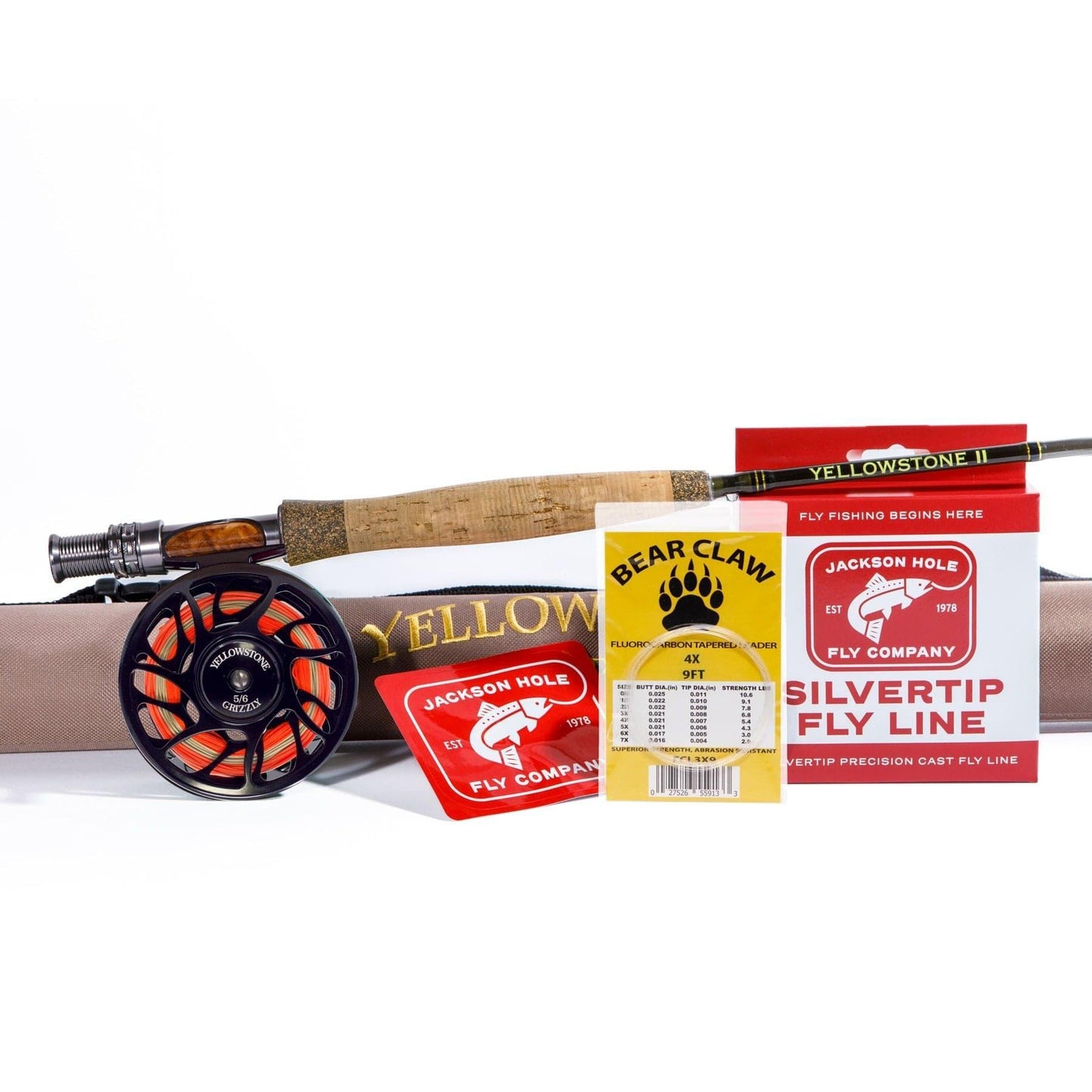 The Jackson Hole Fly Company Missouri River Rod Combo Kit includes an 86 5WT rod, orange/black reel, rod case, fly line packaging, flies, and more—precision gear for dry fly and nymph fishing.