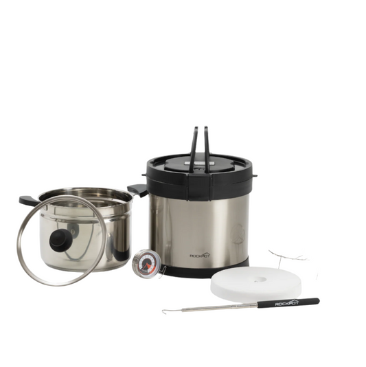 The RockPot Mini by RockPot includes a stainless steel thermal cooker with a black lid, inner pot with glass lid, food thermometer, cutting board, and metal fork—portable survival cookware ideal for off-grid cooking.