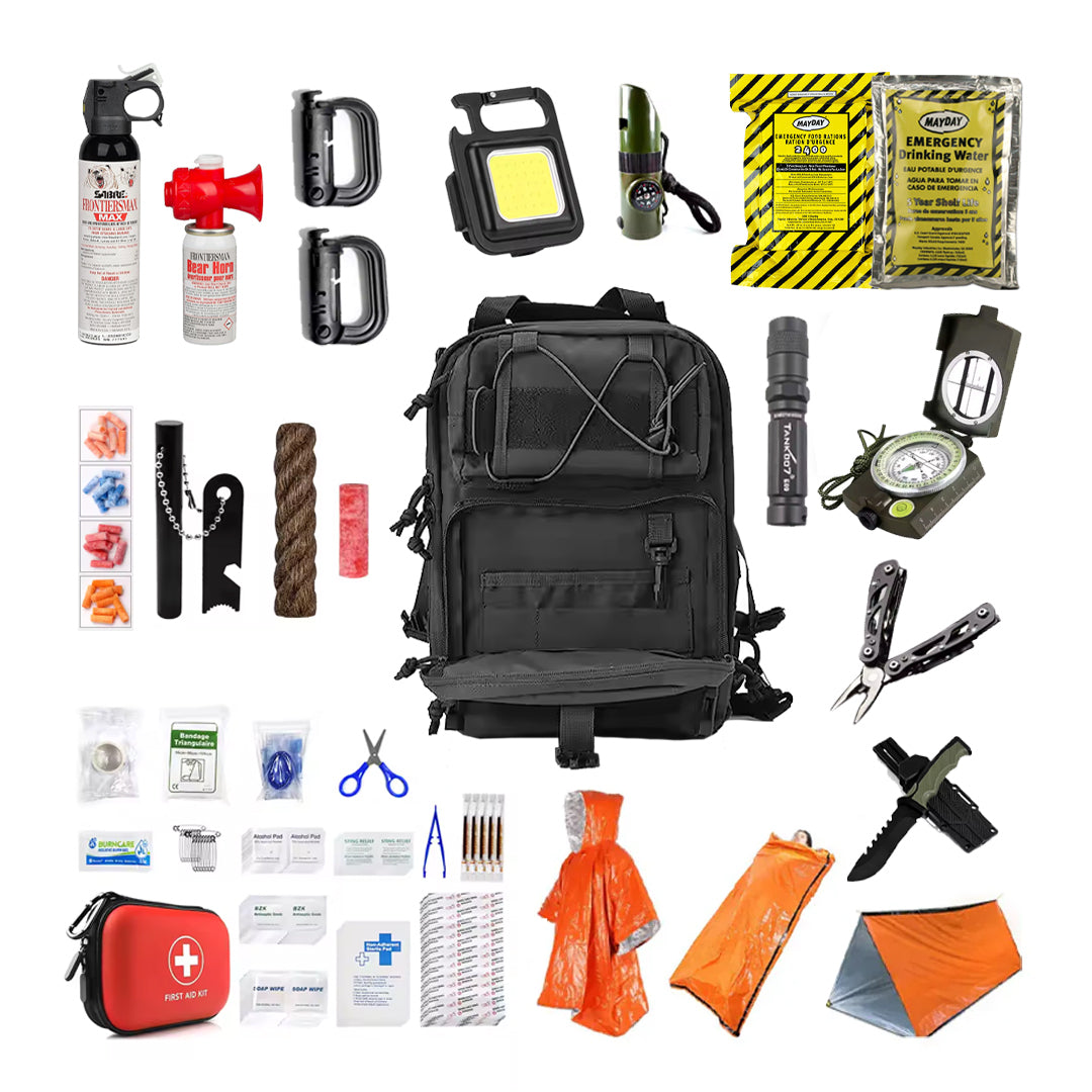 A black Entropy Survival Safe Trail “Survive-All” Go Bag is surrounded by survival essentials like a first aid kit, whistle, flashlight, compass, rain poncho, emergency blanket, knife, rope, bandages, glow stick, and waterproof matches.