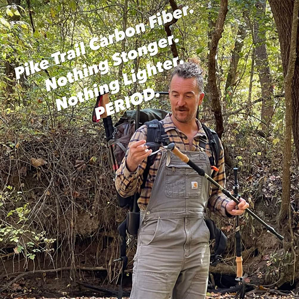 A man in overalls and plaid stands in the woods holding Pike Trail Carbon Fiber Trekking Poles—high performance hiking sticks for hiking, hunting, trekking, and Nordic walking. Text reads: Pike Trail. Nothing Stronger. Nothing Lighter. PERIOD.