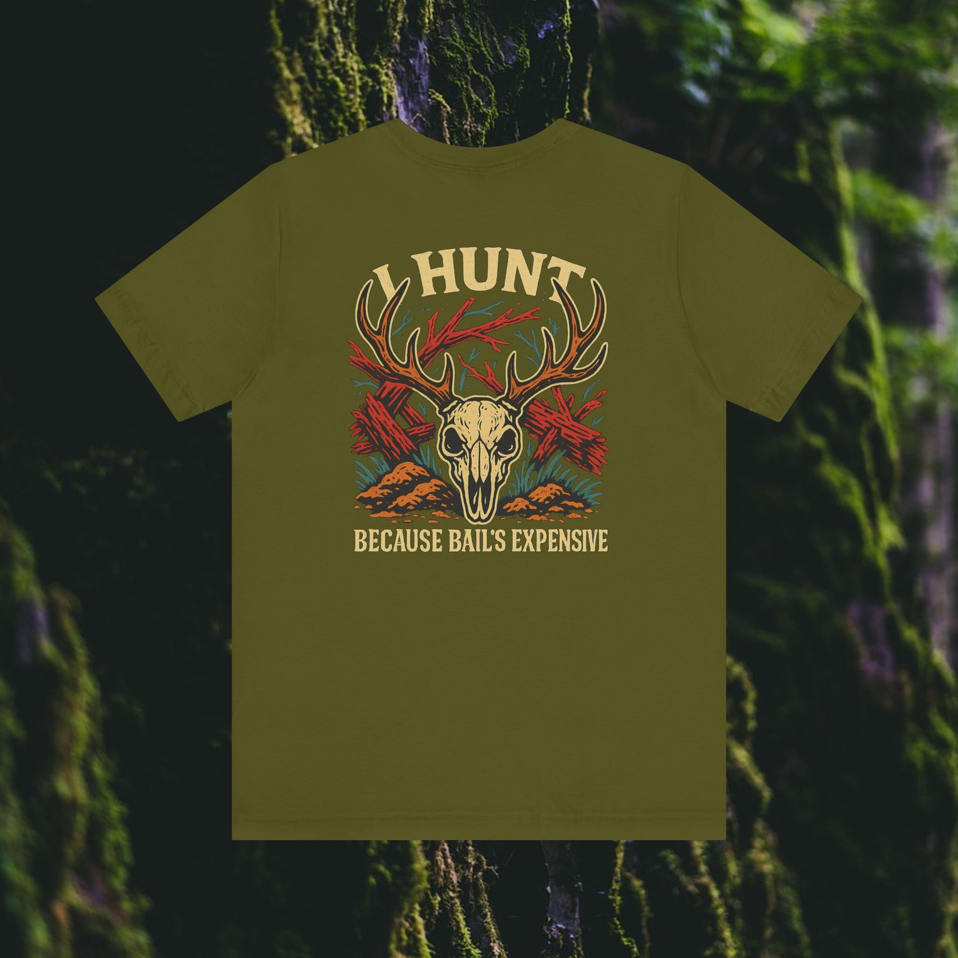 The I Hunt Because Bail’s Expensive Tee – Iron Pines Original from Printify is an olive green unisex shirt with a deer skull, antlers, red maple leaves, and trees—ideal for hunting and forest adventures.