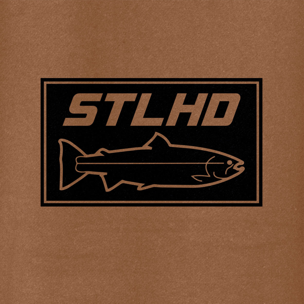The STLHD Mens Yuba River Saddle Brown Premium Hoodie by STLHD GEAR features a black fish outline and bold STLHD text in a rectangular border, inspired by the Yuba River, perfect for pairing with your ultra-soft fleece-lined hoodie.