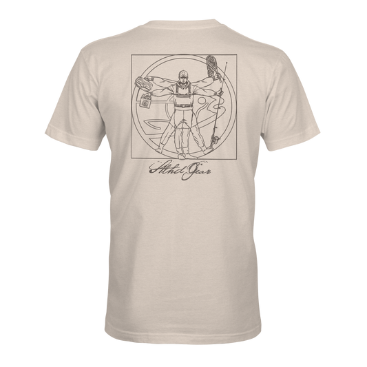 The STLHD Men’s Anatomy T-Shirt by STLHD GEAR is a beige tee with a line drawing of a Vitruvian Man pose—complete with utility belt, spray can, and paint roller—on the back and Strike Gear cursive below. A fresh take on the fishing shirt.