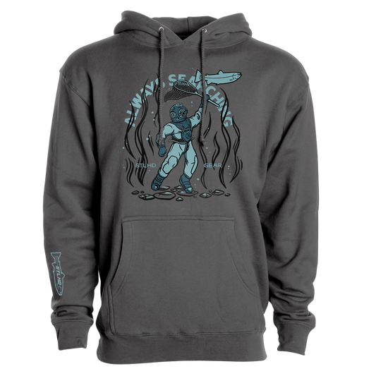 The STLHD GEAR Men’s Deep Dive Premium Hoodie in dark gray features a blue diver with a surfboard underwater, surrounded by seaweed and stones, plus “WAVY SEARCHIN” above and “MIND CLEAR” on the sides for an outdoor adventure vibe.