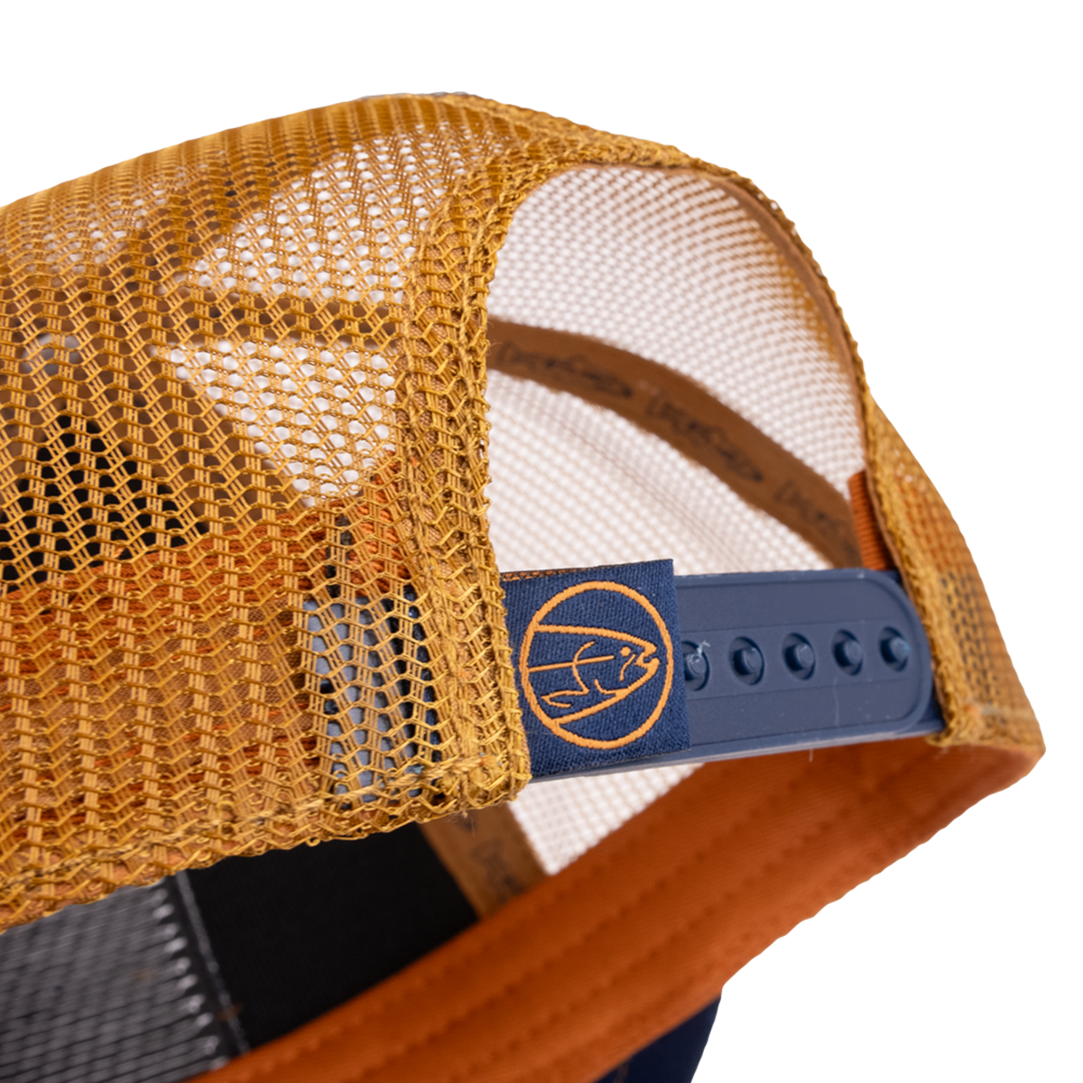 The STLHD Let’er Rip Trucker Hat by STLHD GEAR features yellow mesh, an adjustable blue snapback strap, an orange brim, and a circular logo with a stylized animal—perfect for outdoor adventures.