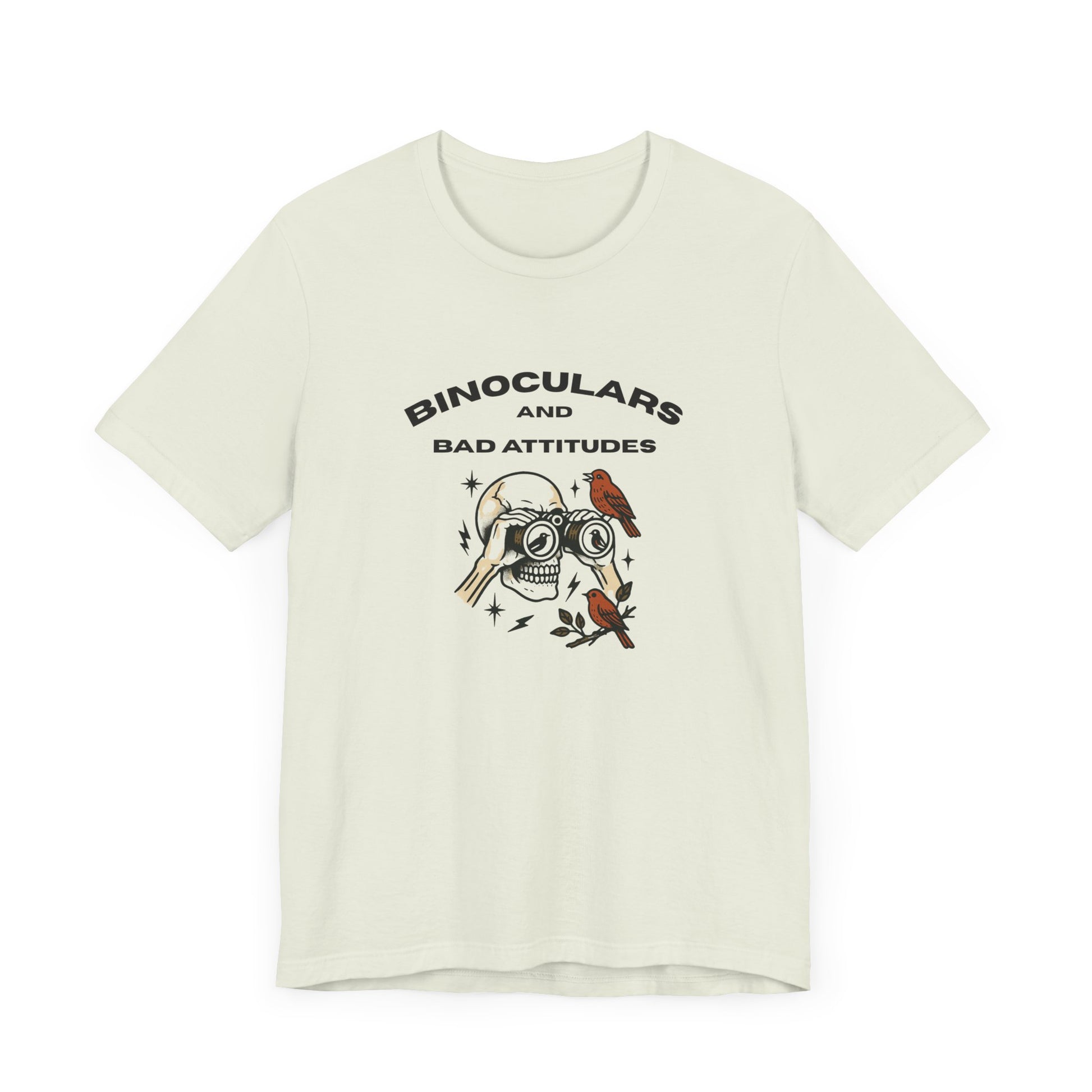 The Printify Bird Watching Is Hardcore T-shirt features a skull with binoculars, birds, and BINOCULARS AND BAD ATTITUDES text—a funny punk birder shirt for misfits, field freaks, or anyone who loves edgy birdwatching style.