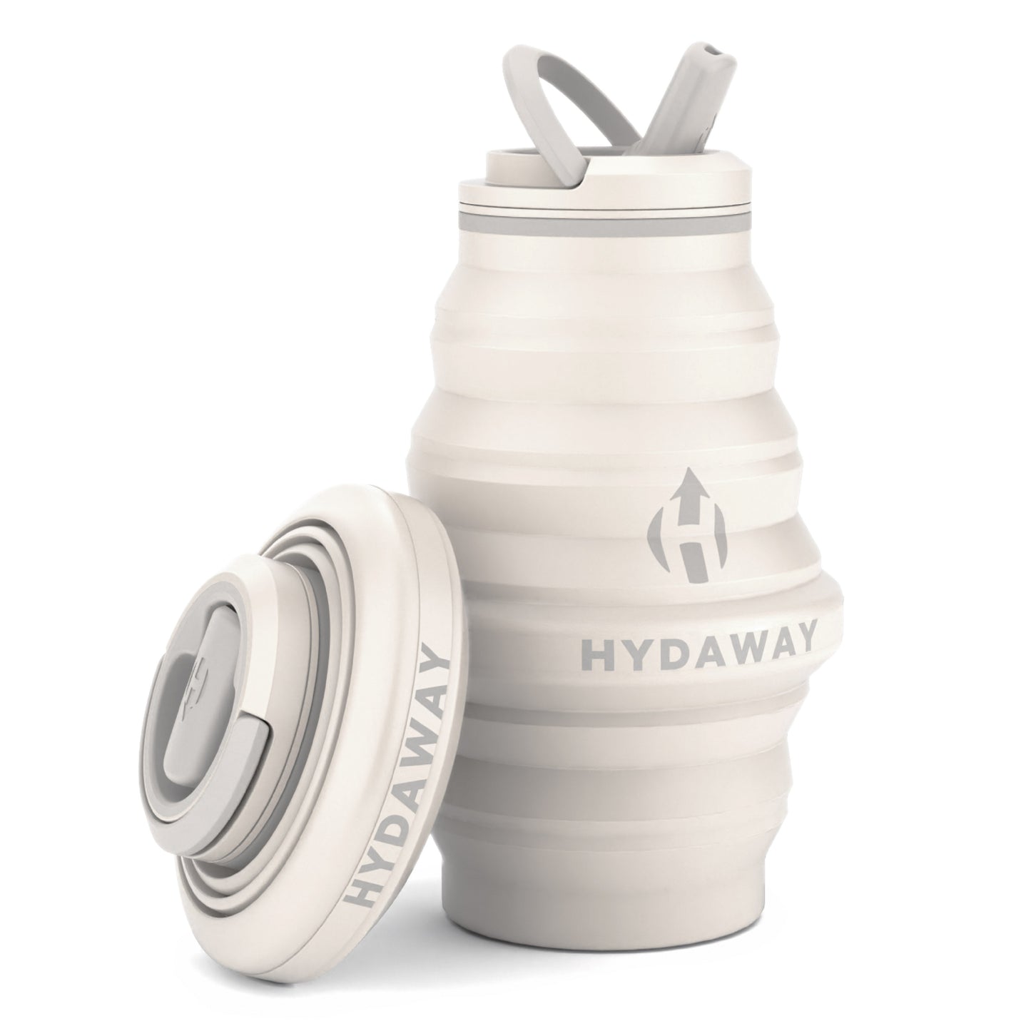 The HYDAWAY 17oz Collapsible Water Bottle from the HYDAWAY Official Store is shown expanded with a lid and straw attached. Made of BPA-free silicone, it comes with an extra lid beside it and displays the brand name on its side.