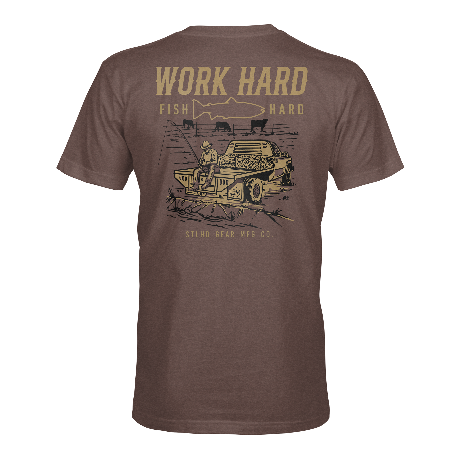The STLHD Rancher T-Shirt by STLHD GEAR features a graphic of a person fishing by a car, “WORK HARD, FISH HARD” with a fish silhouette above, and STLHD GEAR MFG CO. below—a breathable tee for those who live by the motto.