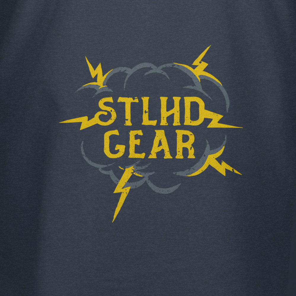 Navy blue t-shirt with yellow 'STLHD GEAR' logo on a dark background