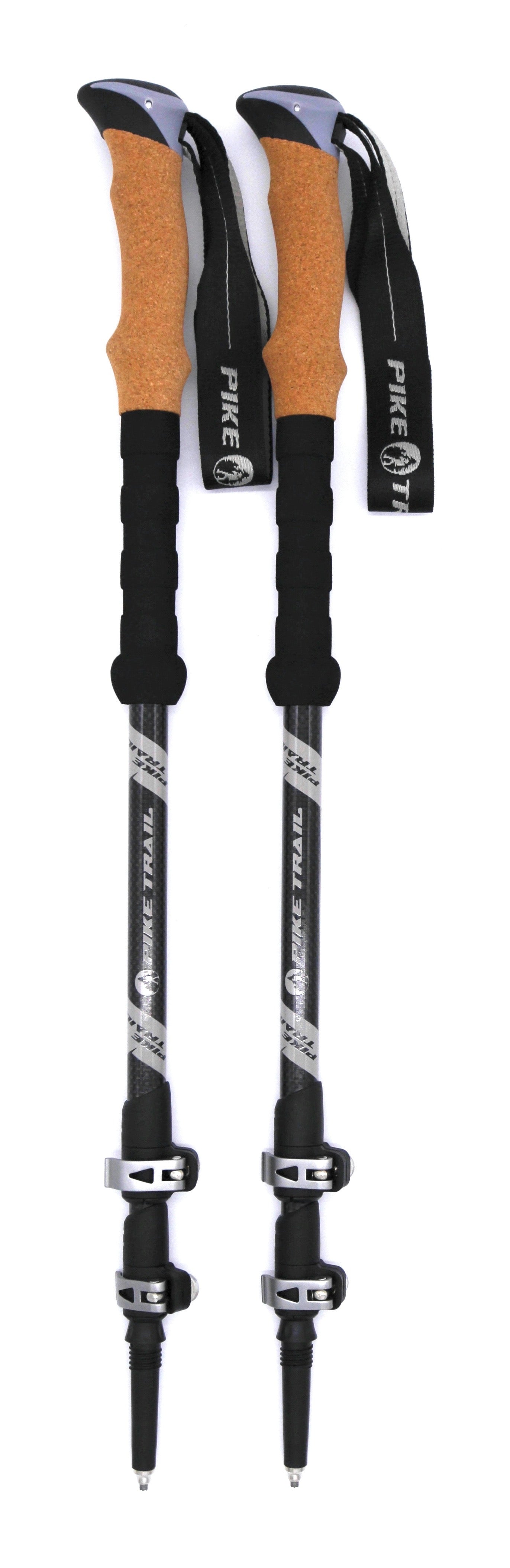 Two Pike Trail Carbon Fiber Trekking Poles stand upright side by side, featuring black and gray design, cork handles, adjustable wrist straps, and lever locks for easy length adjustment.