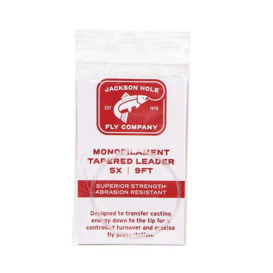 A clear plastic package of Jackson Hole Fly Company JHFLYCO Monofilament Nylon Tapered Leader - 3 Pack, labeled 5X, 9ft, with red and white branding highlighting superior strength and abrasion resistance for fly fishing.