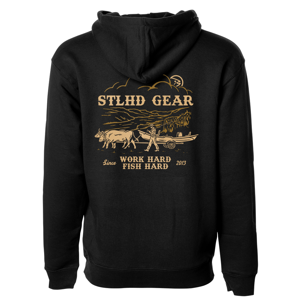Black hoodie with gold STLHD Gear WORK HARD FISH HARD graphic and text on a white background