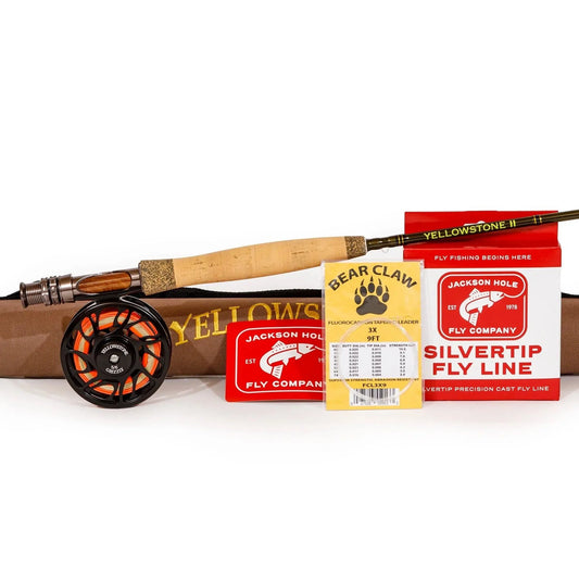 A Jackson Hole Fly Company Dream Stream Rod Combo Kit – 8'6" 6WT with fly reel is shown beside a brown rod case, Bear Claw leader line spool, and Silvertip fly line packaging.