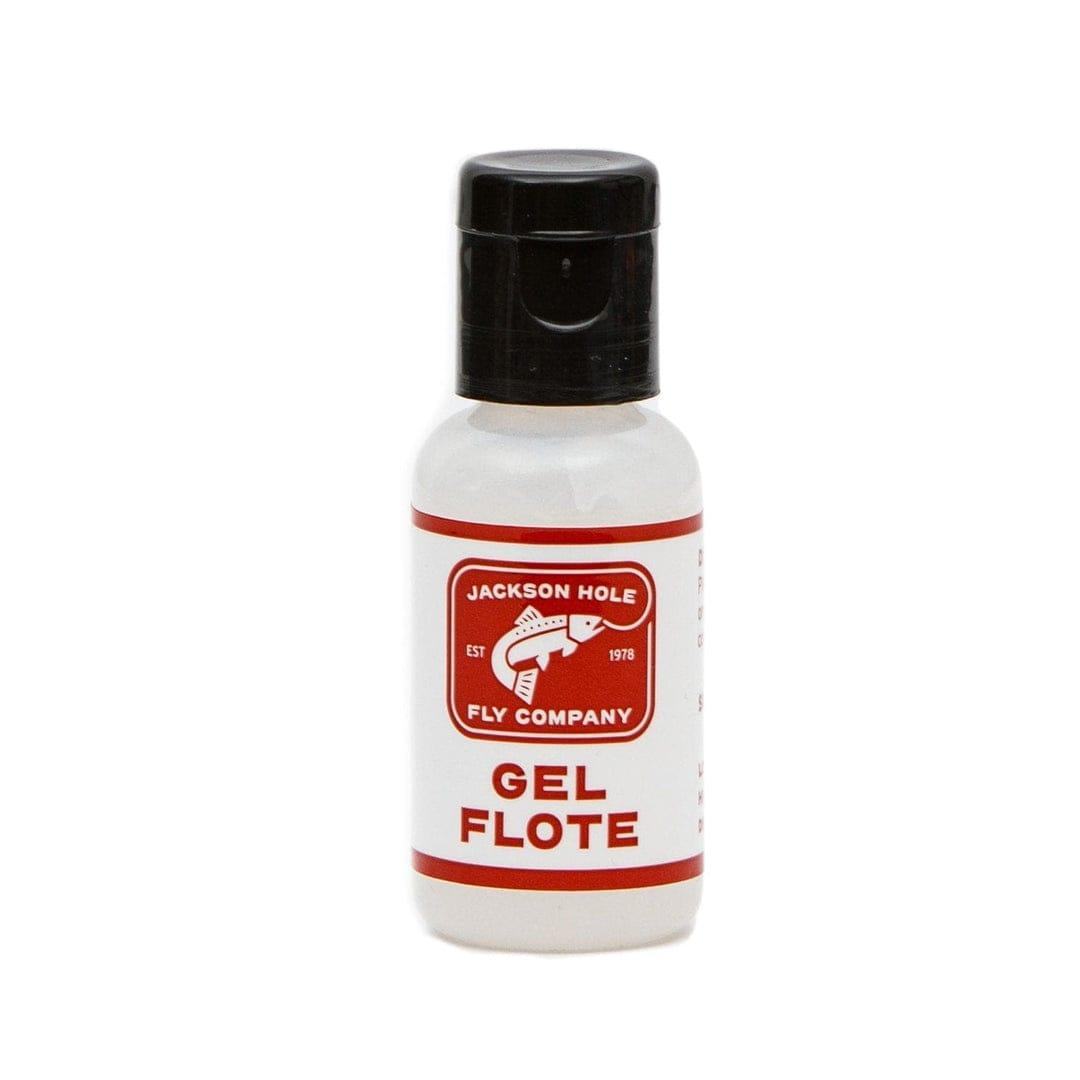 A small white bottle with a black cap, labeled Jackson Hole Fly Company, is ideal for the Granite Creek Fly Fishing Combo Kit – 70 4WT Beginner Setup. Perfect addition to any starter fly fishing combo.