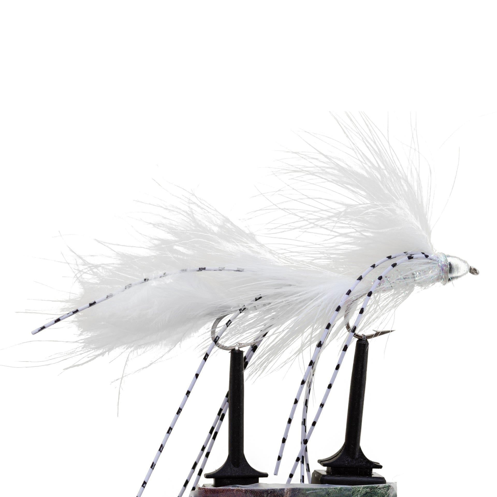 A close-up of the Jackson Hole Fly Company JHFLYCO Loaded Foam Fly Box – Large Streamer Assortment (10 Flies), featuring detailed white artificial flies, ideal for predator fly fishing, displayed on black stands against a white background.