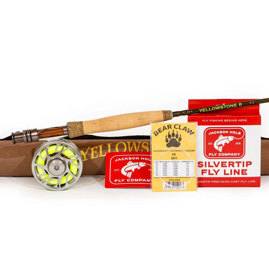 The JHFLYCO Backpacker Rod Combo Kit – 70 4WT Ultralight Precision from Jackson Hole Fly Company includes a rod, reel, brown case, yellow line, Bear Claw leader, and red Silvertip fly line—ideal for backcountry fly fishing.