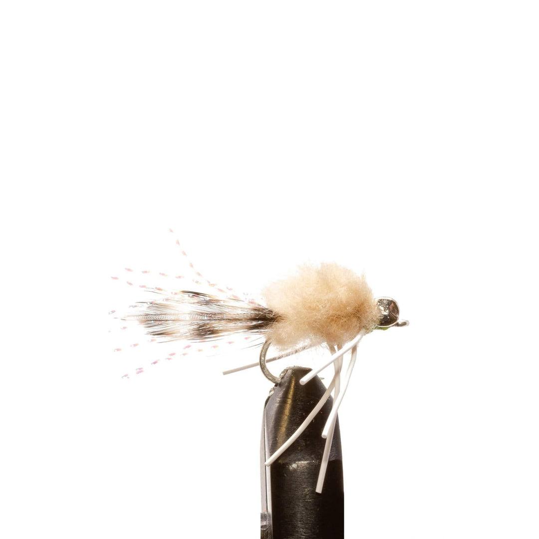A close-up of the Jackson Hole Fly Company JHFLYCO Bonefish Fly Box’s beige and brown artificial fly—preloaded, precision-ready, and saltwater tough—secured in a vise against a white background.