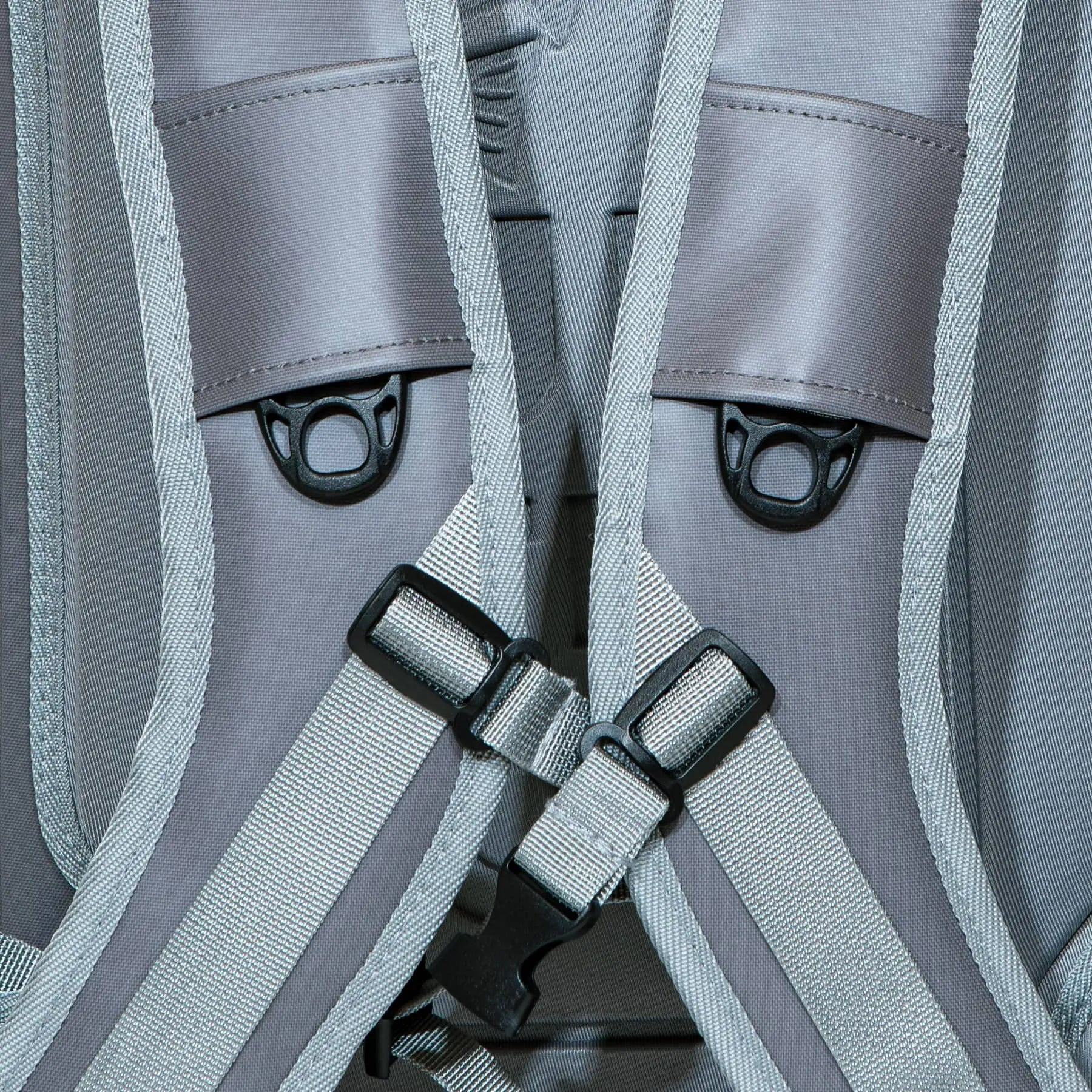 Close-up of JHFLYCO 27L Waterproof Backpack by Jackson Hole Fly Company shows grey 500D PVC shoulder straps with black D-rings, adjustable straps, and detailed stitching for durability. Ready for the Wild.