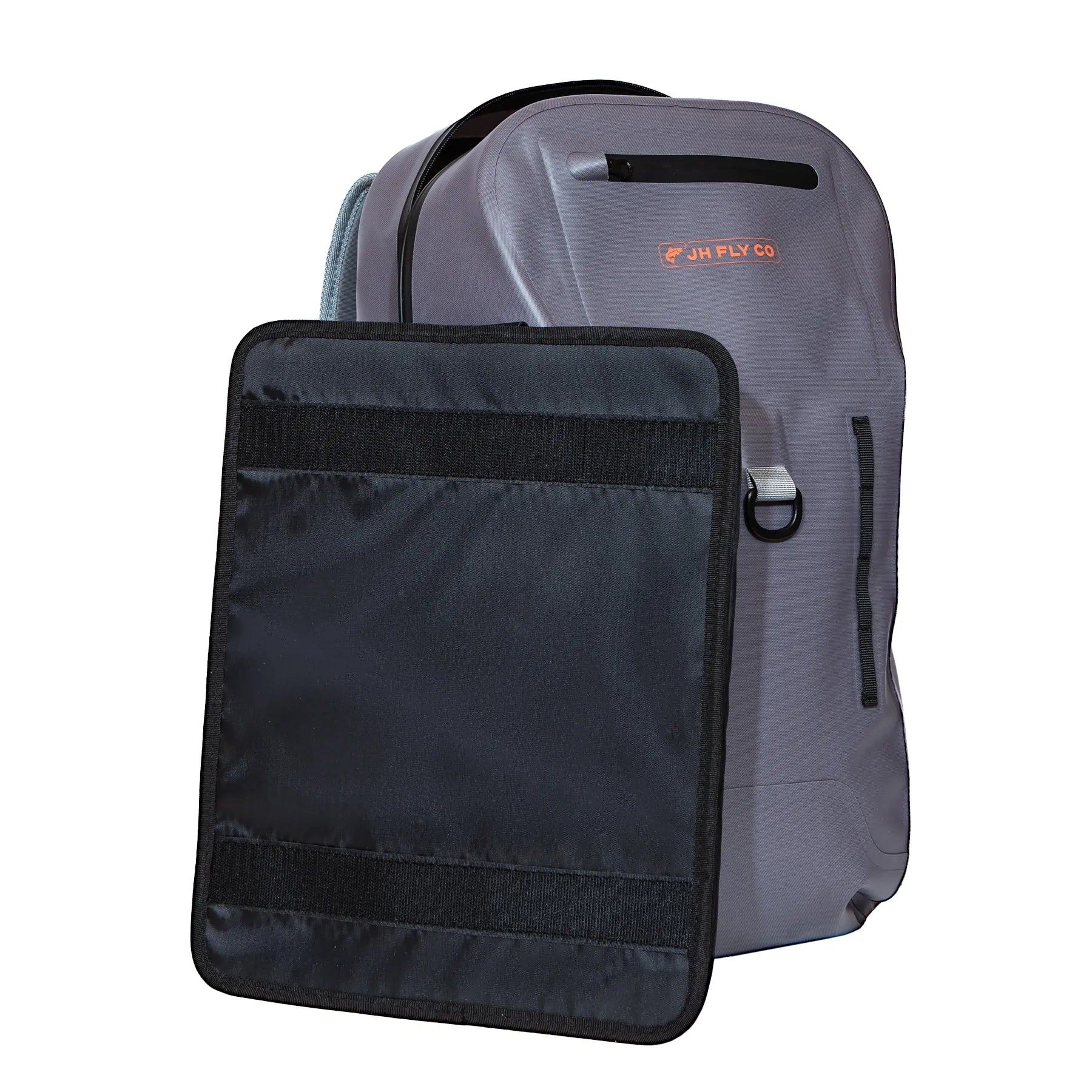 The Jackson Hole Fly Company JHFLYCO 27L Waterproof Backpack, made of gray 500D PVC with a front TIZIP zipper and handle, is shown next to a removable black padded Velcro panel. Ready for the Wild.
