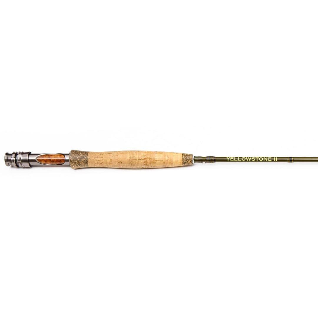 A close-up of the Miracle Mile Rod Combo Kit – 90 6WT from Jackson Hole Fly Company shows a cork handle and metal reel seat, with MIRACLE MILE on the rod shaft—ideal for upgrading your fly fishing combo kit.