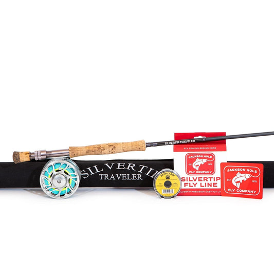 The Jackson Hole Fly Company Tarpon Alley Rod Combo Kit – 90 10WT includes a rod, reel, Silvertip Traveler sleeve, yellow line spool, red fly line box, and two red stickers for inshore saltwater fishing.